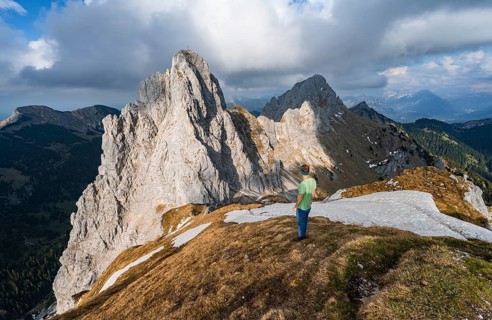 Hiker at the summit of Rote Flueh