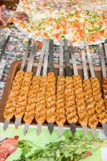Turkish Adana/Urfa Kebab getting ready to be grilled in display