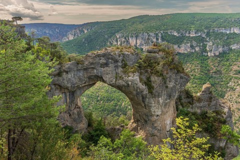 Stone arch above the Gorges du Tarn in the Cevennes National Park. Massif Central France