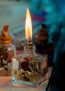 Burning candle making light in view