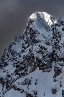 Peak of the Koellenspitze in snowy mountain landscape