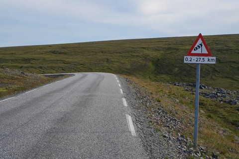 Signpost warning of wind gusts on the island of Mageroya
