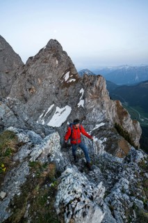 Hikers at the summit of Schartschrofen at sunset