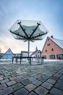 Modern glass roofing on the town hall square