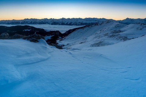 Winter landscape in front of sunrise on the Rickhubel