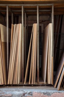 Large rectanguler wood panels stacked up together in display