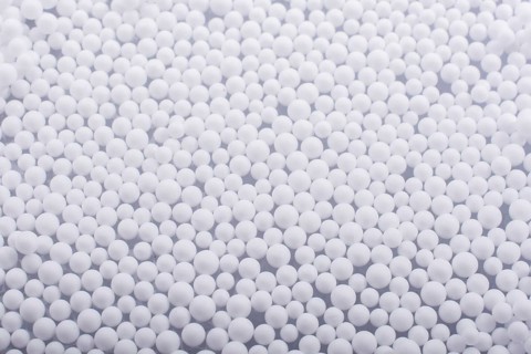 White little polystyrene foam balls as background
