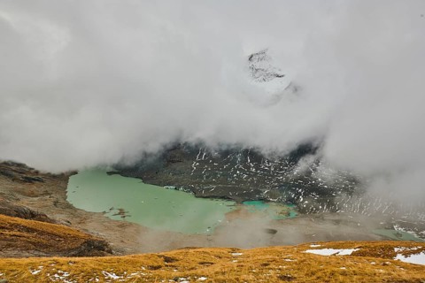 Clouds lying in the valley at Pasterze Hochalpengletscher