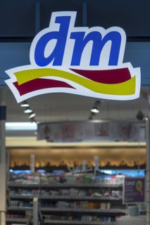Company logo of the drugstore chain dm