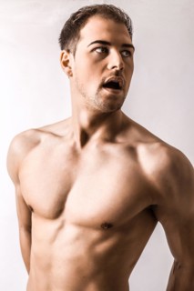 Handsome young man with strong pecs