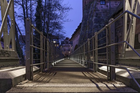 Chain footbridge in evening illumination