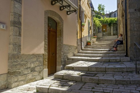 Narrow alley with stairs in old town