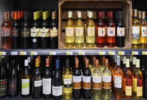 Sales rack various wine bottles