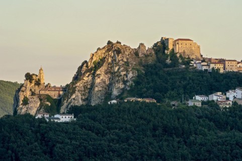 View of the rocky town of Bagnoli del Trigno with the church Chiesa di San Silvestro and the ruined castle Castello San Felice