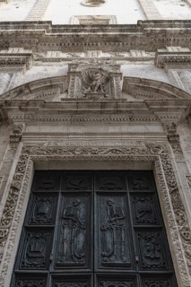 Relief of skeletons on the portal of the Chiesa Rettoria Santa Maria del Suffragio