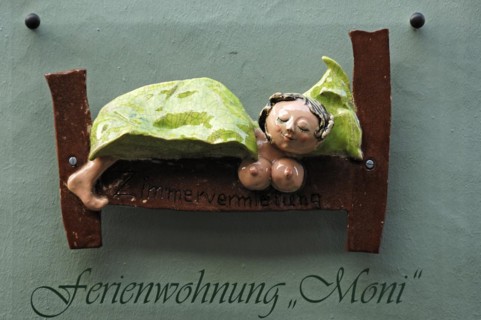 Ceramic figure on a holiday home
