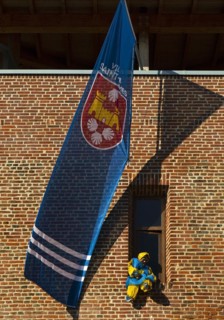 Flag of the twin town Saint-James France and Moehne in the window of the castle at carnival time