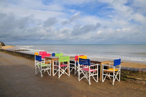 Chairs on the waterfront in Saint-Aubin-sur-Mer in the department of Calvados
