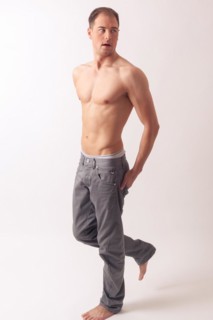 Athletic balanced man with a strong physique