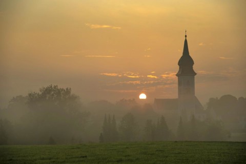 Sunrise in Rottenbuch behind the Church of the Nativity of the Virgin Mary