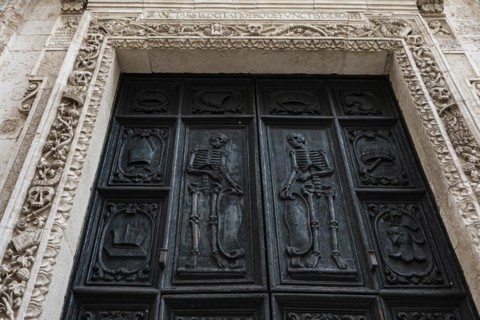 Relief of skeletons on the portal of the Chiesa Rettoria Santa Maria del Suffragio