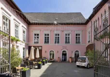 Municipal winery with wine press house and farm building