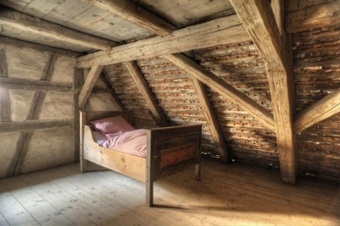 Bed under the roof of a small winegrower
