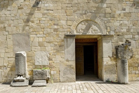Facade with relief stones and inscriptions