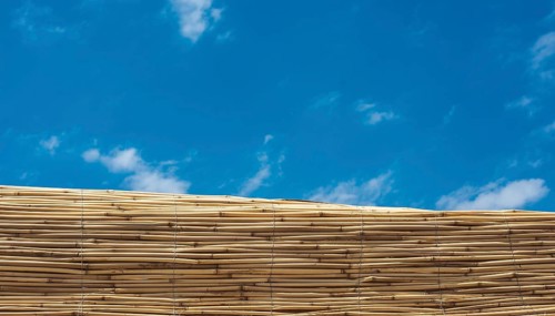Mat made of straw used as a wall outdoors