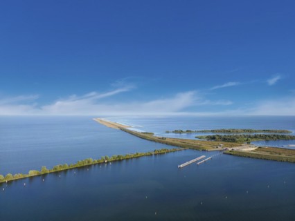 Aerial view with the Markerwaarddijk between Markermeer and IJsselmeer