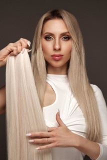 Beautiful blond girl with a perfectly hair