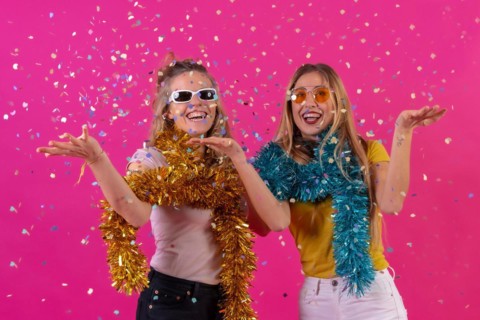 Two young blonde caucasian women partying