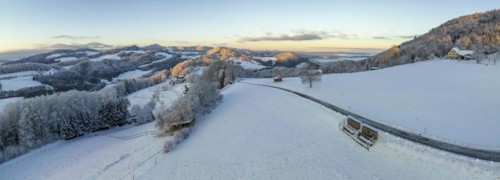 Panorama over snow-covered Jura mountains