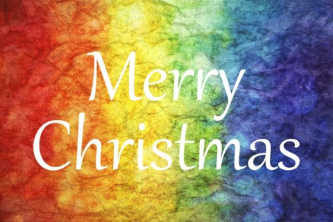 Merry Christmas words on LGBT textured background