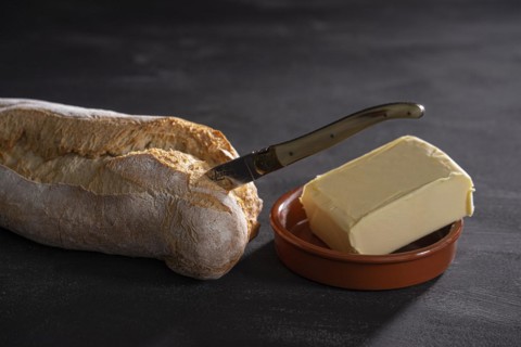 Ciabatta bread with knife and butter
