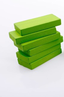 Colorful Domino Blocks in a line on a white background