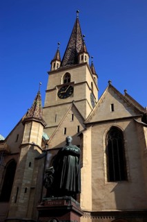 Protestant town parish church and statue of Friedrich Teutsch
