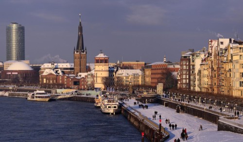 Rhine bank and old town in the snow