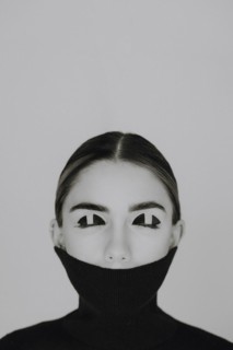 Woman with closed eyes and special eye make-up