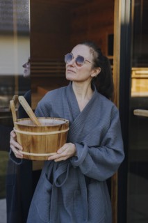 Woman taking a sauna