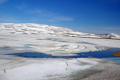 Lakes covered in ice that slowly breaks