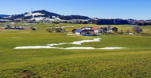 Apere meadows with farm