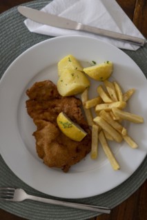 Wiener Schnitzel with parsley potatoes and french fries