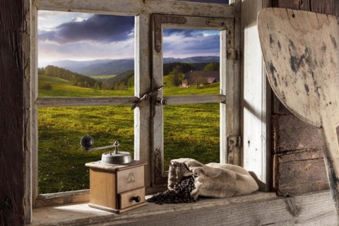 Farmhouse parlour with coffee grinder and coffee beans on the windowsill