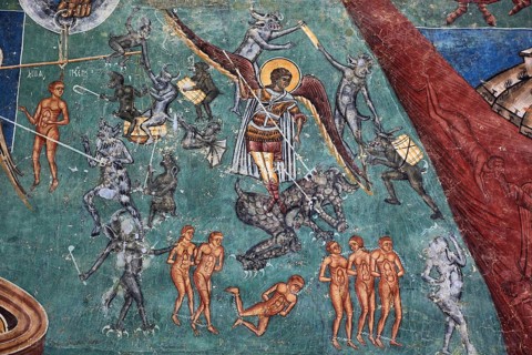 Frescoes on the outer wall. The Voronet Monastery
