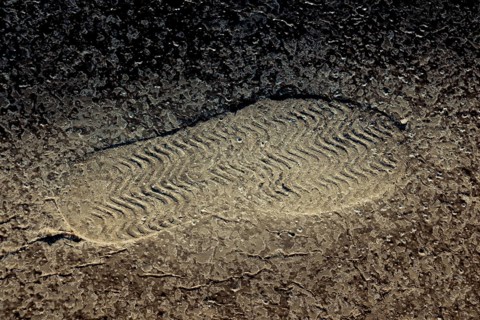 Footstep pattern seen on a concrete background