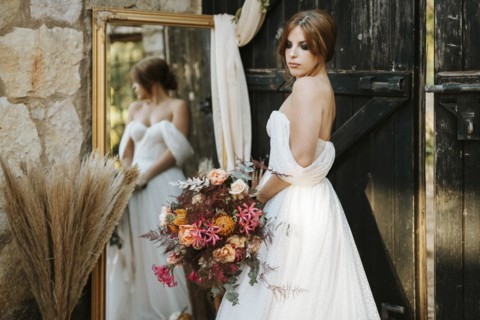 Beautiful bride in rustic arrangement