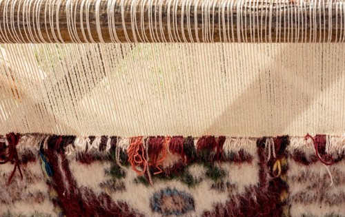 Carpet of traditional types made on a loom