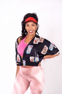 Portrait of black ethnic woman dancing on a white background