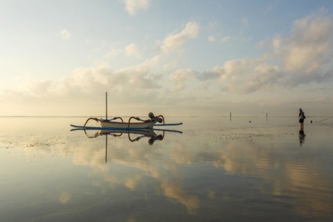 Fishing outriggers on the beach of Sanur